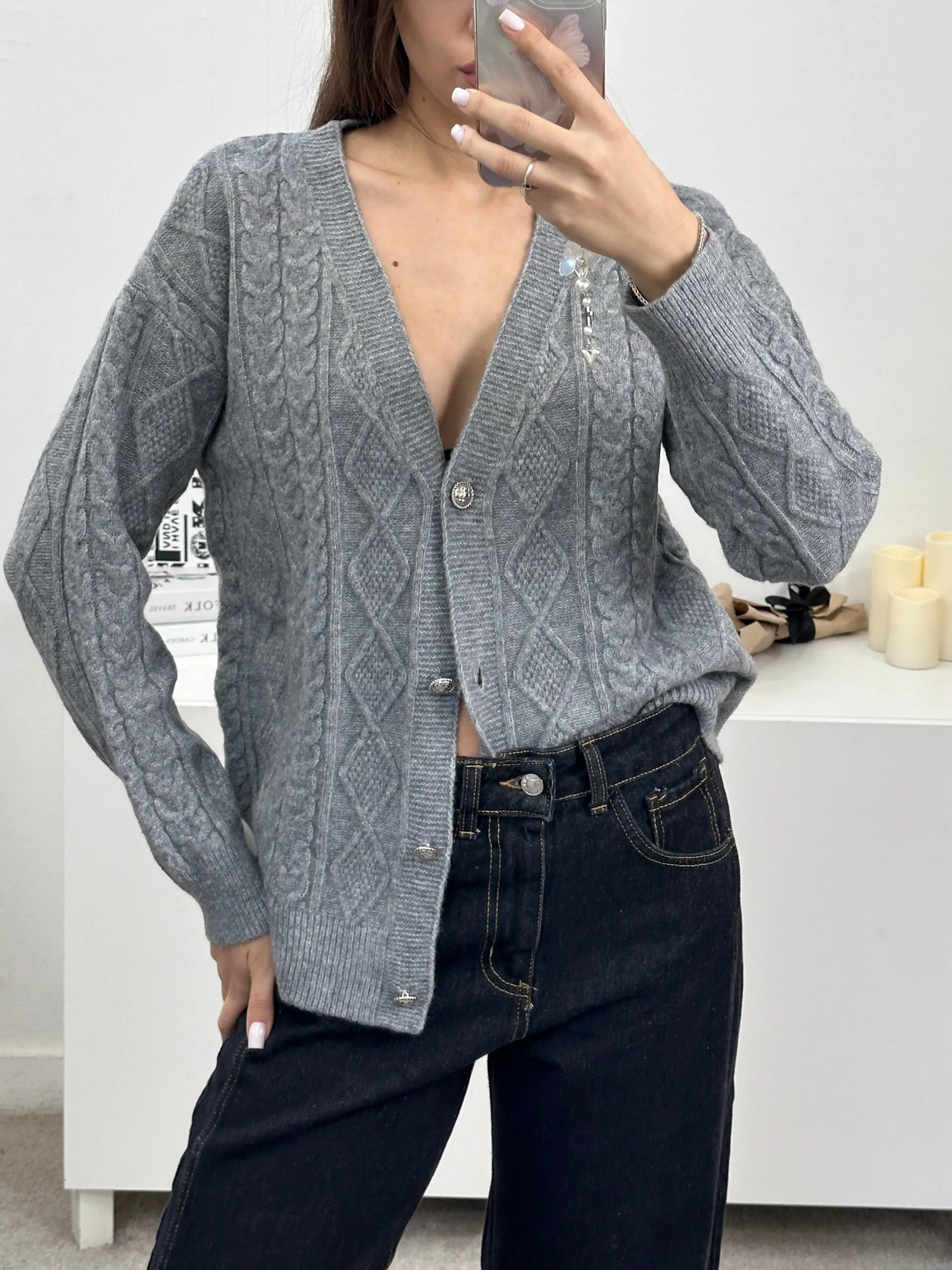 Cardigan con trama trecce