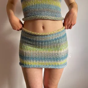 Handmade knitted mini skirt in green, beige, yellow and blue